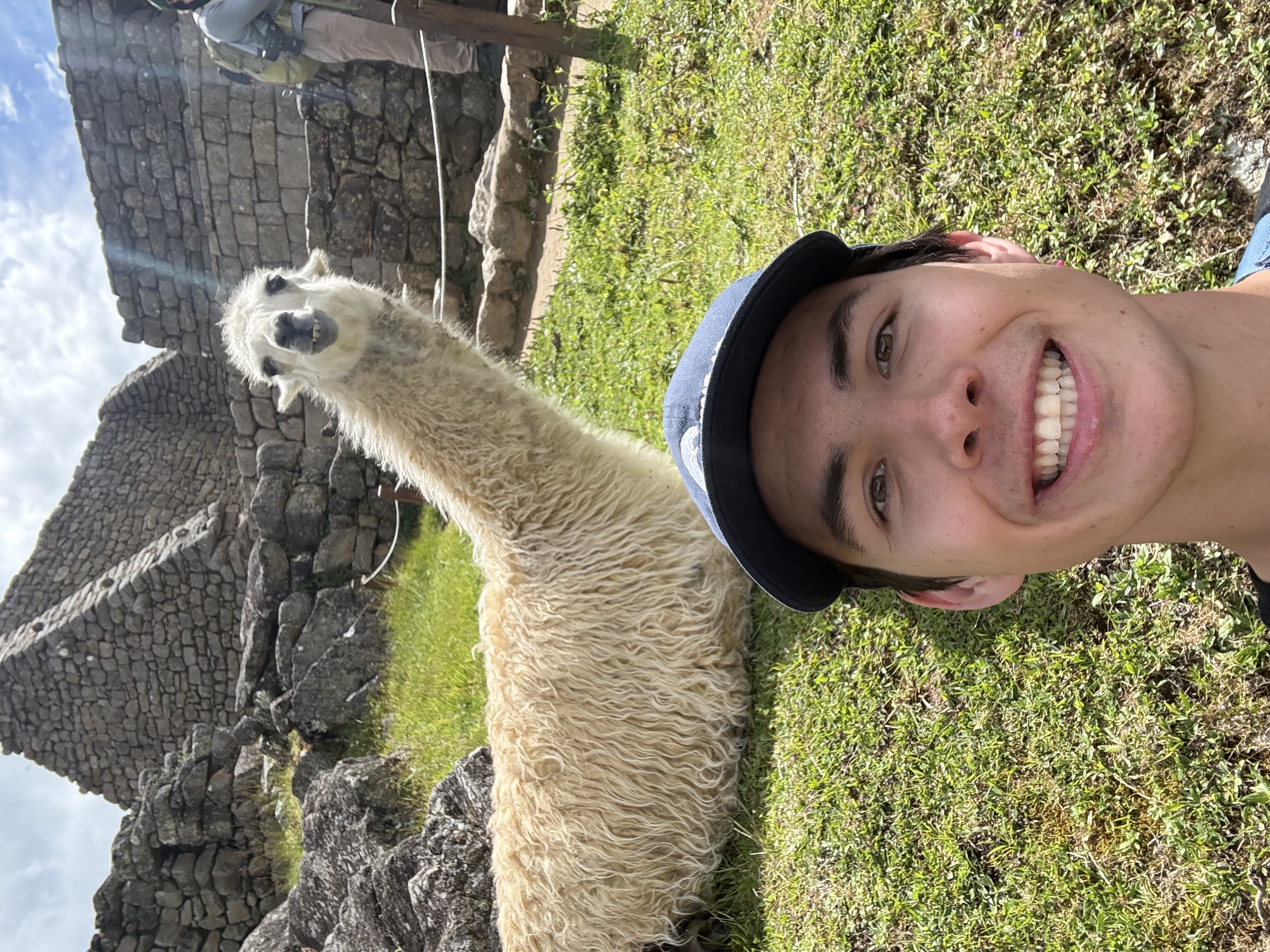 Spencer selfie with a llama at Machu Picchu
