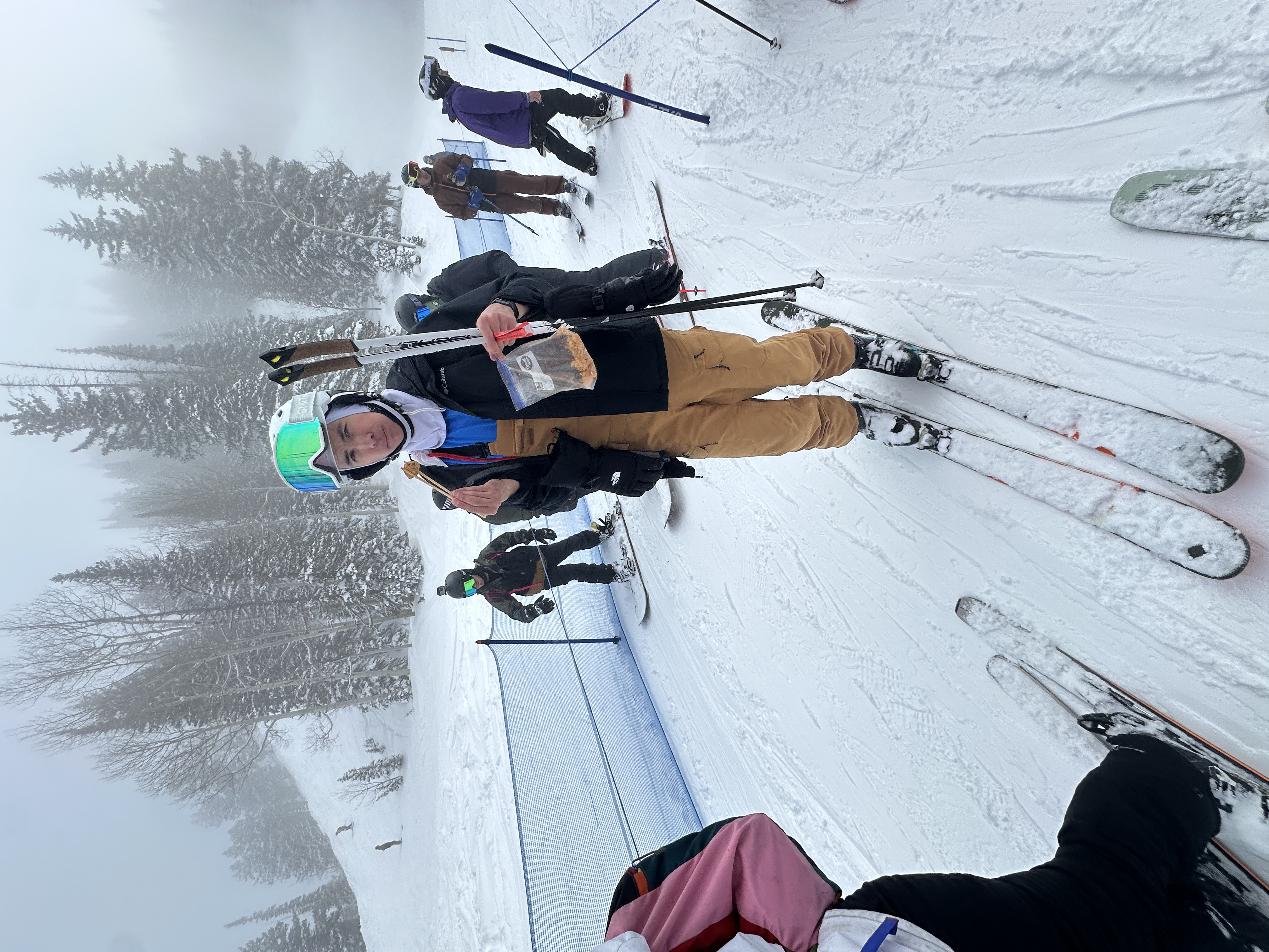Spencer skiing on a powder day